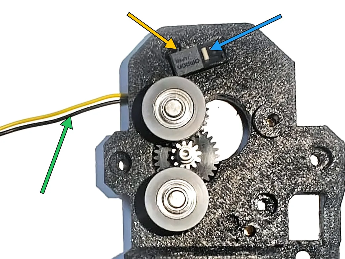 Step 6, mounting the runout switch: Insert the filament runout switch (H) into the slot at the top of the main body.